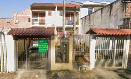 Casa em condomínio fechado com 2 quartos à venda na Rua Água Turquesa, 372, Morada do Vale II, Gravataí, 93 m2 por R$ 260.000