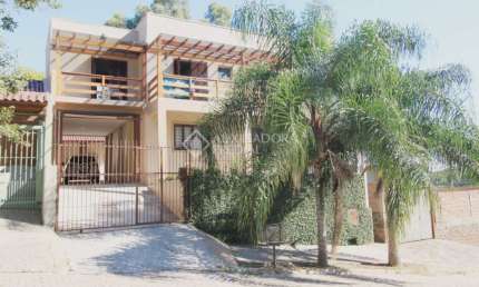 Casa em condomínio fechado com 4 quartos à venda na Rua Porto Alegre, 574, Encosta do Sol, Estância Velha, 268 m2 por R$ 720.000