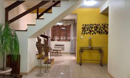 Casa em condomínio fechado com 3 quartos à venda na Rua Carlos Schmit Filho, 171, Ideal, Novo Hamburgo, 134 m2 por R$ 532.000