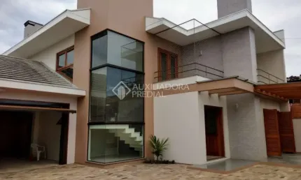 Casa em condomínio fechado com 3 quartos à venda na ALBANO HANSEN, 1542, Travessão, Dois Irmãos, 238 m2 por R$ 1.140.000