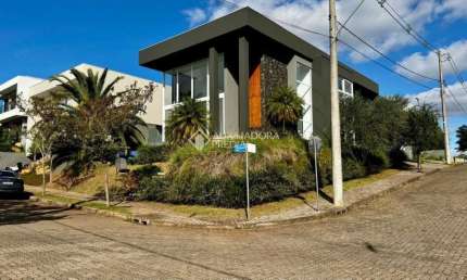 Casa em condomínio fechado com 4 quartos à venda na Rua Elmo Henrique Prade, 10, Encosta do Sol, Estância Velha, 416 m2 por R$ 3.409.370