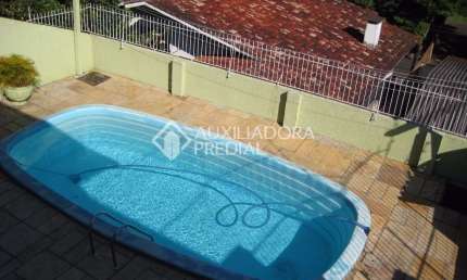 Casa em condomínio fechado com 4 quartos à venda na Rua Júlio Adams, 146, Guarani, Novo Hamburgo, 205 m2 por R$ 477.000