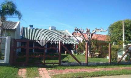 Casa em condomínio fechado com 3 quartos à venda na GOVERNADOR ERNESTO DORNELES, 1935, Zona Nova, Tramandaí, 171 m2 por R$ 380.000