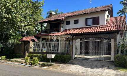 Casa em condomínio fechado com 4 quartos à venda na Rua Encruzilhada do Sul, 505, Mauá, Novo Hamburgo, 238 m2 por R$ 980.000