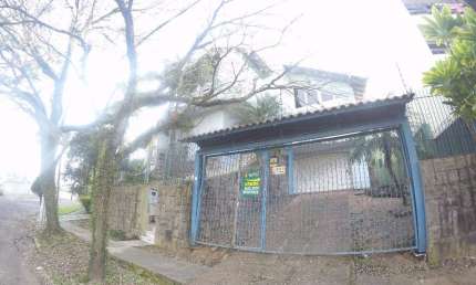 Casa em condomínio fechado com 3 quartos à venda na Rua Júlio Adams, 1, Guarani, Novo Hamburgo, 437 m2 por R$ 1.040.000