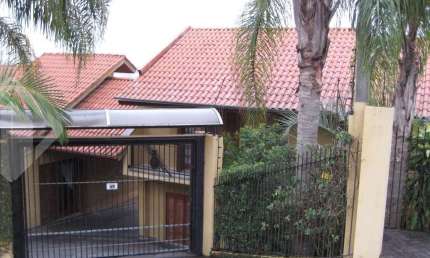 Casa em condomínio fechado com 4 quartos à venda na Rua Gramado, 478, Ouro Branco, Novo Hamburgo, 380 m2 por R$ 1.350.000