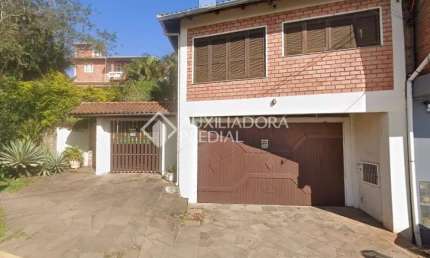 Casa em condomínio fechado com 4 quartos à venda na Rua João Aloysio Algayer, 1906, Lomba Grande, Novo Hamburgo, 360 m2 por R$ 1.000.000
