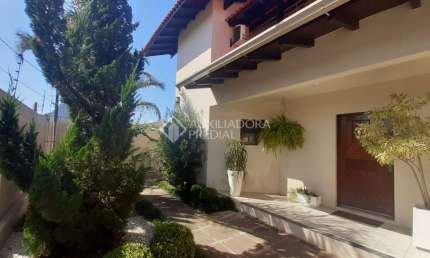 Casa com 5 quartos à venda na Rua Carlos Walter Jung, 354, Santo Afonso, Novo Hamburgo, 270 m2 por R$ 1.100.000