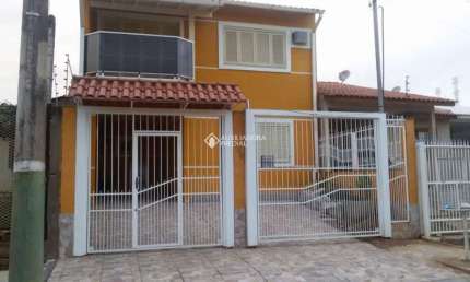 Casa com 3 quartos à venda na Rua Condores, 446, Jardim Algarve, Alvorada, 119 m2 por R$ 590.000