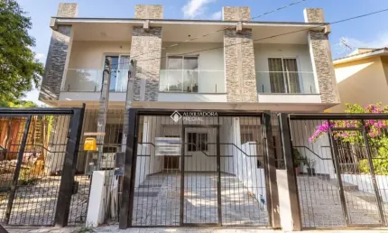 Casa com 3 quartos à venda na Rua Abdo Jorge Curi, 235, Parque Santa Fé, Porto Alegre, 143 m2 por R$ 499.000
