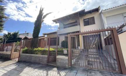Casa em condomínio fechado com 3 quartos à venda na Rua Juruá, 105, Jardim São Pedro, Porto Alegre, 309 m2 por R$ 1.290.000