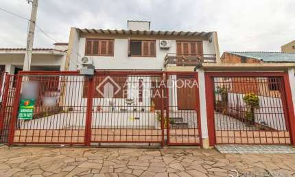 Casa em condomínio fechado com 5 quartos à venda na Rua Doutor Murtinho, 1097, Bom Jesus, Porto Alegre, 247 m2 por R$ 640.000