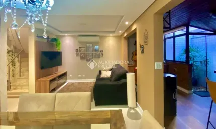 Casa em condomínio fechado com 3 quartos à venda na Avenida Willy Eugênio Fleck, 1500, Sarandi, Porto Alegre, 144 m2 por R$ 975.000