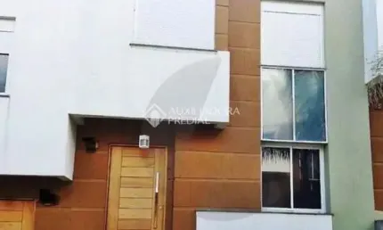 Casa em condomínio fechado com 3 quartos à venda na Rua Alberto Jerônimo Guerra, 20, Mário Quintana, Porto Alegre, 147 m2 por R$ 510.000