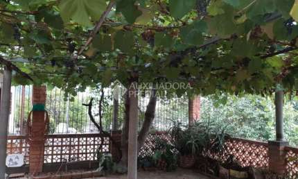 Casa em condomínio fechado com 2 quartos à venda na Rua Eloema de Oliveira Barcelos, 370, Morro Santana, Porto Alegre, 80 m2 por R$ 320.000