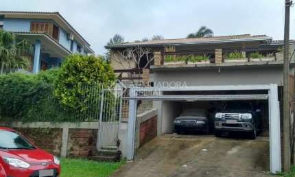 Casa em condomínio fechado com 3 quartos à venda na Rua Pinheiros, 120, São Lucas, Viamão, 223 m2 por R$ 570.000