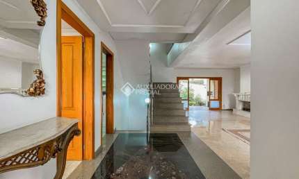Casa em condomínio fechado com 3 quartos à venda na Rua Licínio Cardoso, 305, Chácara das Pedras, Porto Alegre, 548 m2 por R$ 2.960.000