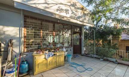 Casa em condomínio fechado com 5 quartos à venda na Rua João Berutti, 324, Chácara das Pedras, Porto Alegre, 352 m2 por R$ 1.500.000
