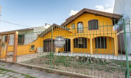 Casa com 4 quartos à venda na Rua Alfredo Silveira Dias, 169, Nonoai, Porto Alegre, 240 m2 por R$ 960.000