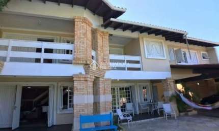 Casa com 3 quartos à venda na Rua Paná Paná, 892, Atlântida, Xangri-Lá, 236 m2 por R$ 1.490.000