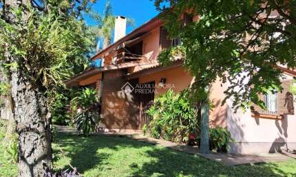 Casa com 4 quartos à venda na Rua Itapitocaí, 725, Cristal, Porto Alegre, 365 m2 por R$ 1.599.000