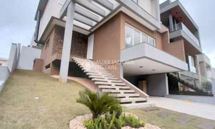 Casa em condomínio fechado com 4 quartos à venda na Rua Adolfo Inácio de Barcelos, 1490, Centro, Gravataí, 266 m2 por R$ 1.929.000