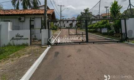 Casa em condomínio fechado com 3 quartos à venda na Avenida Eduardo Prado, 695, Cavalhada, Porto Alegre, 185 m2 por R$ 795.000