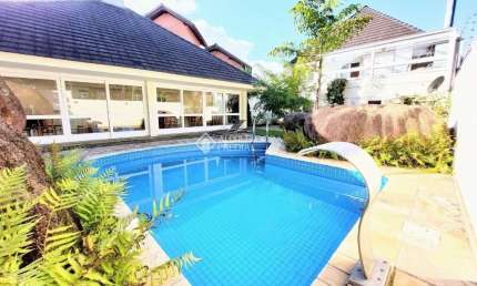 Casa em condomínio fechado com 3 quartos à venda na Rua Doutor Arnaldo da Silva Ferreira, 465, Jardim Isabel, Porto Alegre, 209 m2 por R$ 1.350.000
