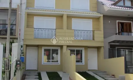 Casa em condomínio fechado com 3 quartos à venda na Rua Nestor José Nitschke, 38, Guarujá, Porto Alegre, 133 m2 por R$ 520.000