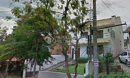 Casa em condomínio fechado com 3 quartos à venda na Rua Padre Paulo Englert, 70, Espírito Santo, Porto Alegre, 190 m2 por R$ 700.000