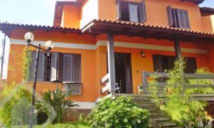 Casa em condomínio fechado com 5 quartos à venda na Rua Ângelo Passuelo, 79, Vila Nova, Porto Alegre, 215 m2 por R$ 650.000