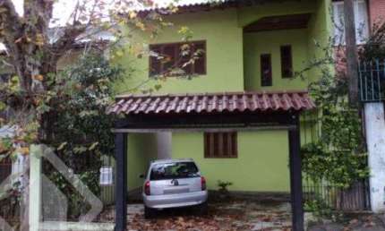 Casa em condomínio fechado com 3 quartos à venda na Rua Pedro Velho, 264, Partenon, Porto Alegre, 180 m2 por R$ 390.000