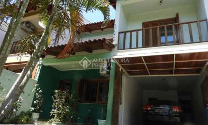 Casa em condomínio fechado com 3 quartos à venda na Rua Márcio Dias, 176, Nonoai, Porto Alegre, 317 m2 por R$ 780.000