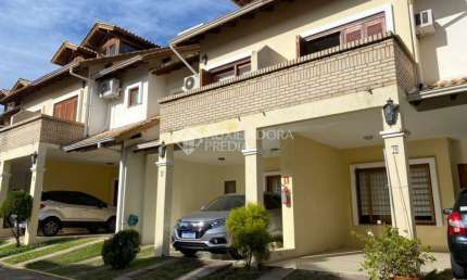 Casa em condomínio fechado com 3 quartos à venda na EDUARDO PRADO, 2165, 1954, Vila Nova, Porto Alegre, 186 m2 por R$ 1.450.000