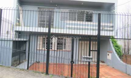 Casa em condomínio fechado com 3 quartos à venda na Rua Oscar Schneider, 513, Medianeira, Porto Alegre, 254 m2 por R$ 648.000