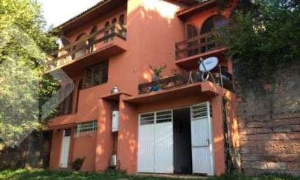 Casa em condomínio fechado com 4 quartos à venda na Rua Amapá, 836, Vila Nova, Porto Alegre, 279 m2 por R$ 1.200.000
