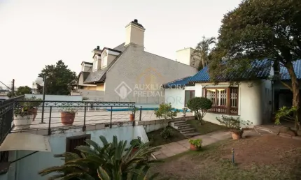 Casa em condomínio fechado com 5 quartos à venda na Rua Mozart, 133, Três Figueiras, Porto Alegre, 300 m2 por R$ 2.100.000