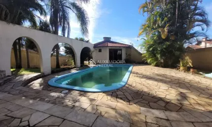 Casa com 4 quartos à venda na Rua Governador Walter Jobim, 250, Primavera, Novo Hamburgo, 427 m2 por R$ 670.000