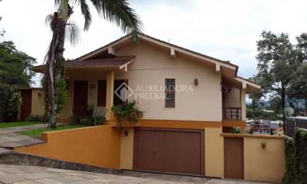Casa com 4 quartos à venda na ANA ALFERIA KLERING, 115, Centro, Bom Princípio, 285 m2 por R$ 638.300