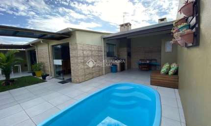 Casa com 4 quartos à venda na Josue Guimarães, 208, Mariluz (Distrito), Imbé, 111 m2 por R$ 490.000