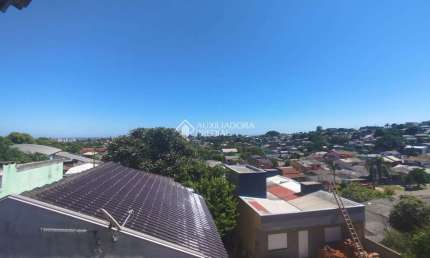 Casa com 3 quartos à venda na Avenida Tharcilo Nunes, 695, Santo André, São Leopoldo, 76 m2 por R$ 220.000