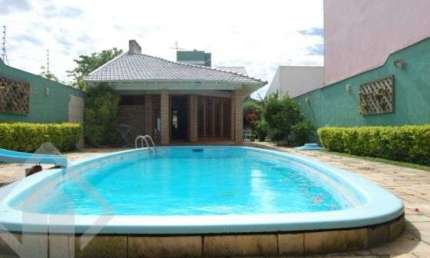 Casa em condomínio fechado com 4 quartos à venda na Rua Dulcimar Cardoso, 340, Paraíso, Sapucaia do Sul, 340 m2 por R$ 1.060.000