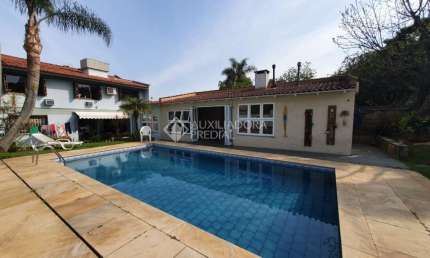 Casa em condomínio fechado com 4 quartos à venda na Travessa Pedra Redonda, 130, Jardim Isabel, Porto Alegre, 500 m2 por R$ 2.200.000