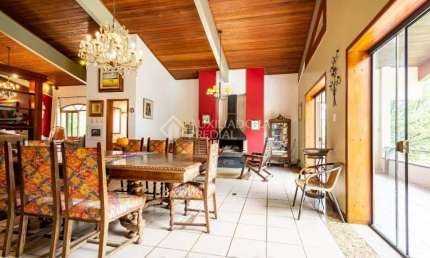 Casa em condomínio fechado com 5 quartos à venda na Avenida da Cavalhada, 5205, Cavalhada, Porto Alegre, 565 m2 por R$ 3.800.000