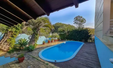 Casa em condomínio fechado com 4 quartos à venda na Rua Dona Adda Mascarenhas de Moraes, 1167, Jardim Itu Sabará, Porto Alegre, 367 m2 por R$ 1.150.000