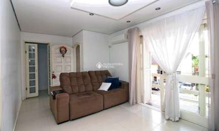 Casa em condomínio fechado com 4 quartos à venda na Rua Vital Brasil, 69, Jardim Itu Sabará, Porto Alegre, 182 m2 por R$ 650.000