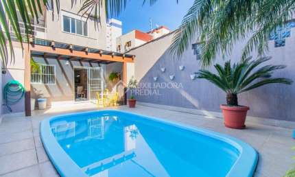 Casa em condomínio fechado com 3 quartos à venda na Rua Leite de Castro, 46, Jardim Itu Sabará, Porto Alegre, 210 m2 por R$ 1.080.000