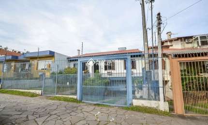 Casa com 3 quartos à venda na Rua Butuí, 185, Cristal, Porto Alegre, 210 m2 por R$ 890.000