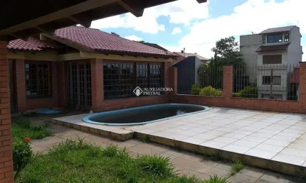 Casa com 3 quartos à venda na Rua Kyve T Knijnik, 15, Espírito Santo, Porto Alegre, 280 m2 por R$ 1.300.000