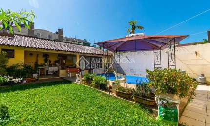 Casa com 5 quartos à venda na Rua Moacyr Godoy Ilha, 242, Espírito Santo, Porto Alegre, 360 m2 por R$ 740.000